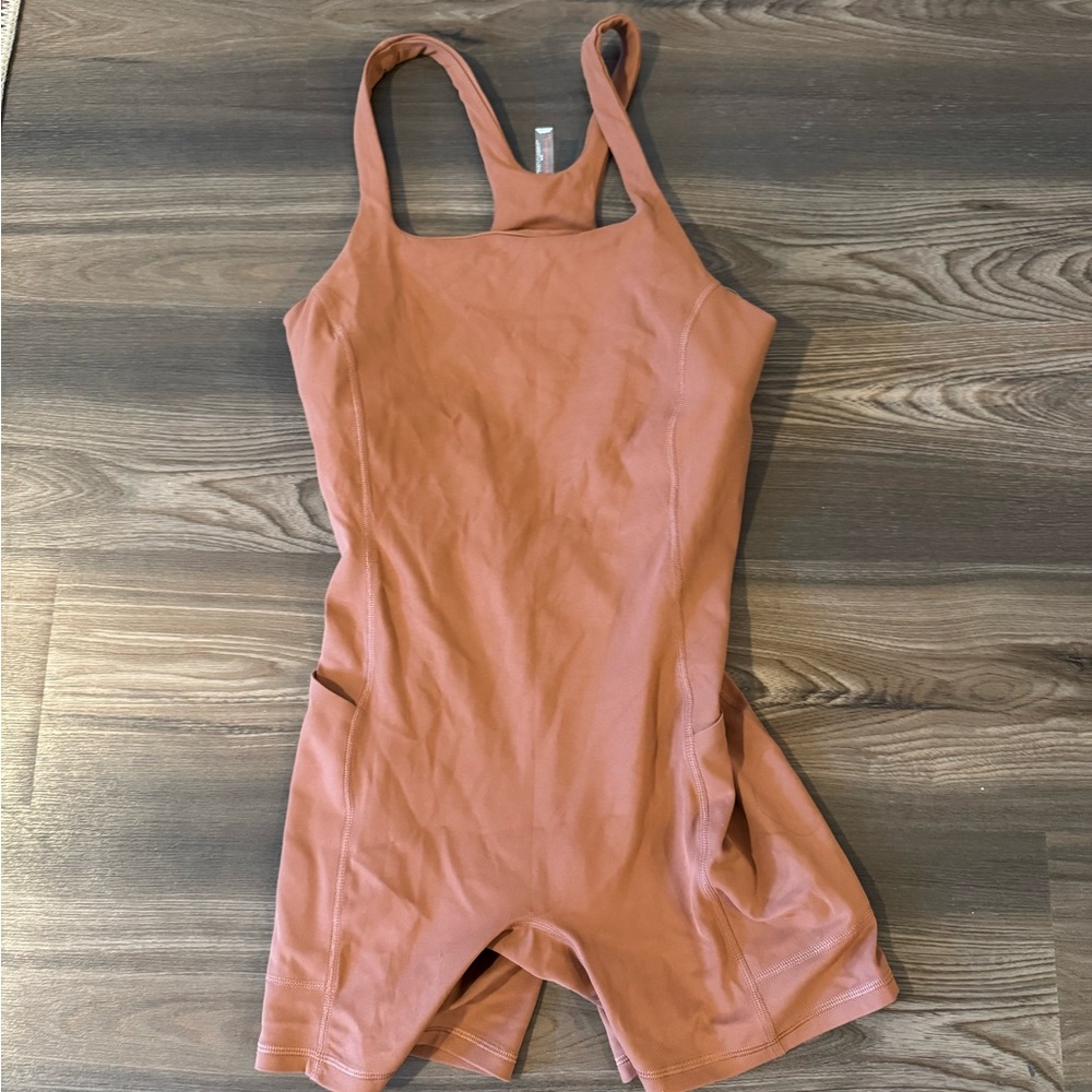FP Movement by Free People burnt orange runsie